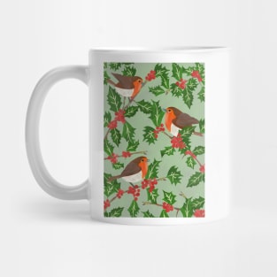 Three little paper cut robins on a holly bush Mug